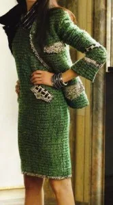 Woman wearing a custom green tweed dress with embellished pockets and cuffs, showcasing vibrant bespoke cocktail fashion and expert craftsmanship at From Collars to Cuffs in South Florida